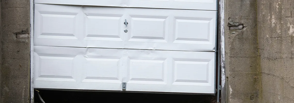 Garage Door Got Hit By A Car Dent Removal in Nepean, ON
