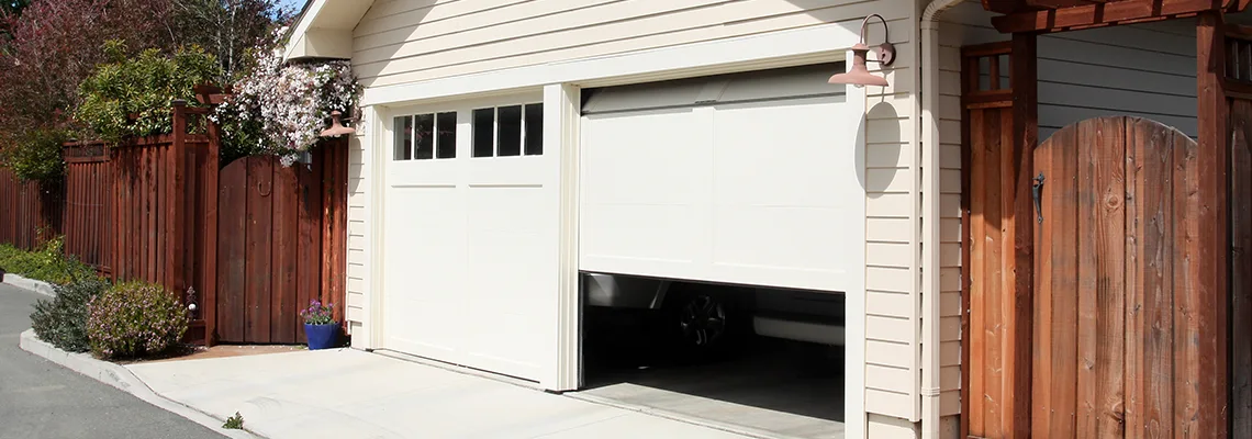 Fix Metal Garage Door Jerking in Nepean, Ontario